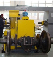 Fully automatic microcomputer controlled wheel set unloader