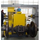 Fully automatic microcomputer controlled wheel set unloader
